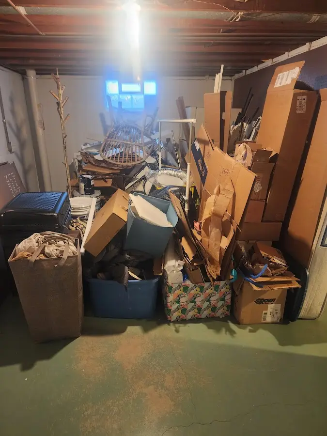 Roll-off dumpster container at job site for 2 Yard Dumpster Rental in Schenectady